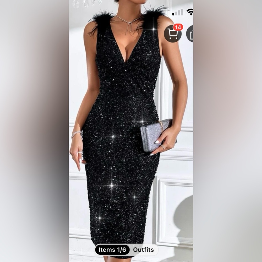 Black sequins cocktail dress with feathers on shoulders.